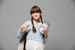 student with a jar of money